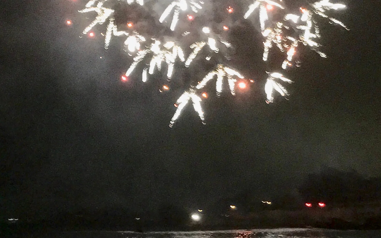 Colorful lantern festival fireworks lighting up the night sky with vibrant celebration